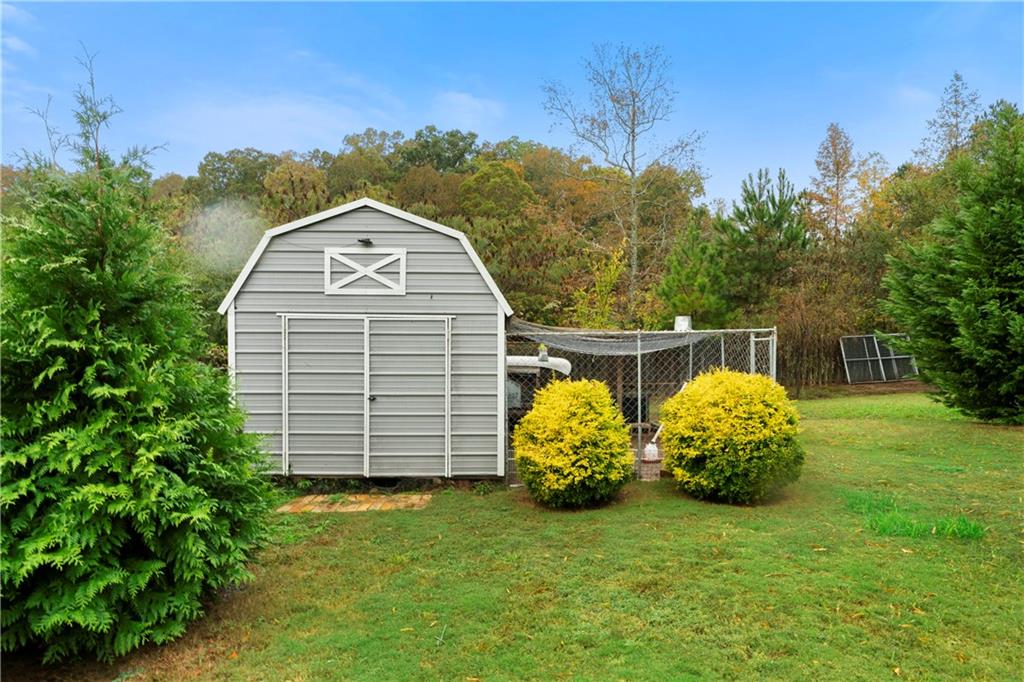 50 Round Rock Circle Northeast Rome, GA 30161 - Photo 24 of 24 a view of a tiny house with yard