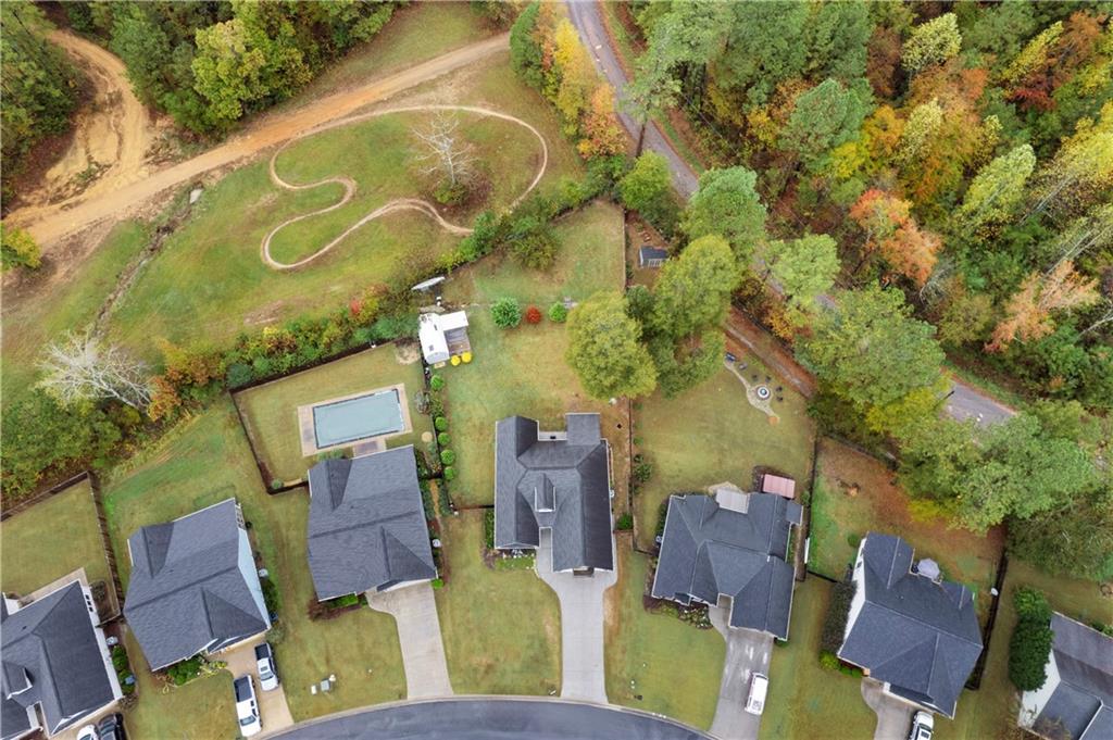 50 Round Rock Circle Northeast Rome, GA 30161 - Photo 3 of 24 an aerial view of a house with yard swimming pool and outdoor seating