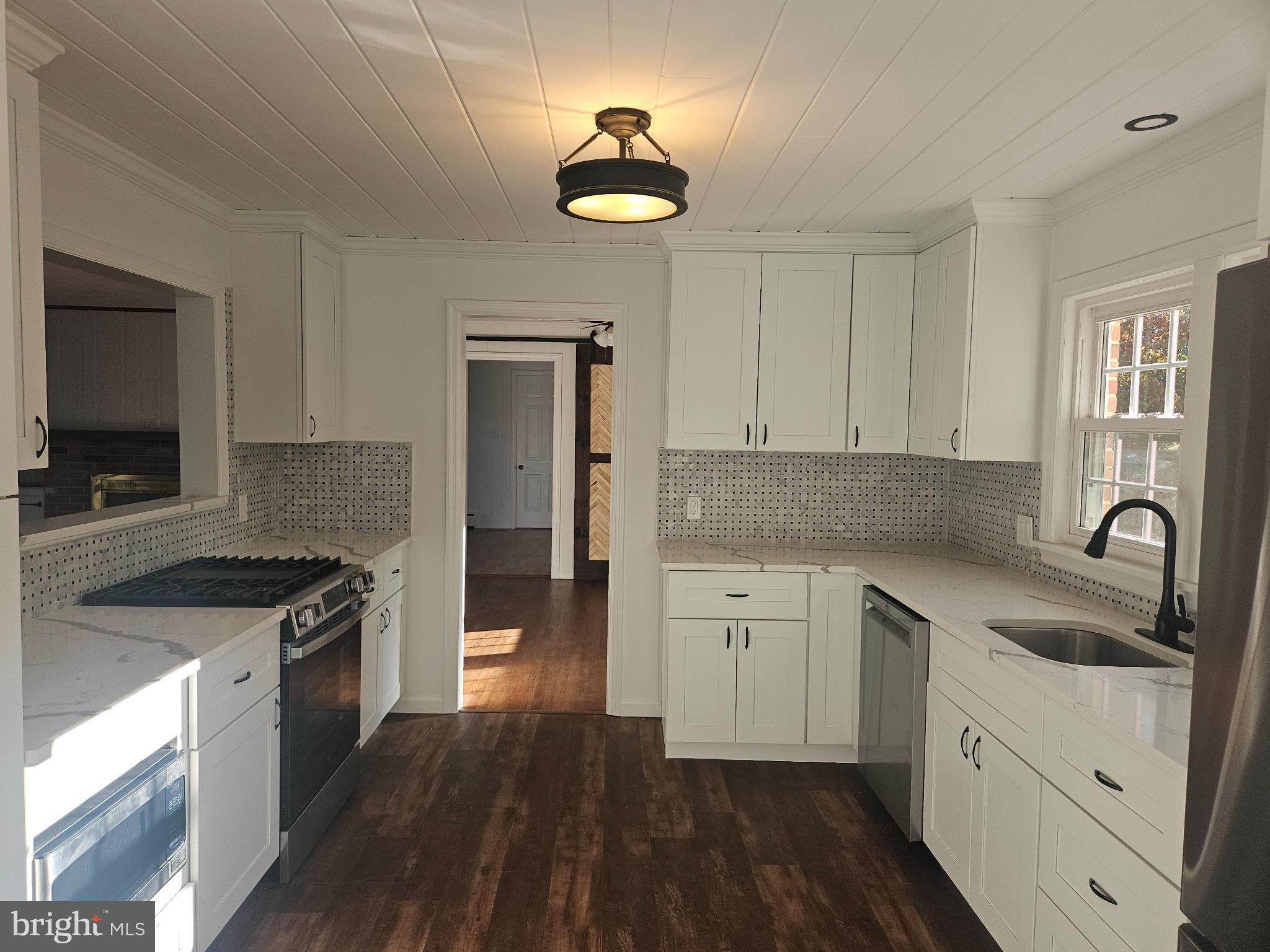 296 Extonville Road Allentown, NJ 08501 - Photo 13 of 46 Modern kitchen with sleek finishes.