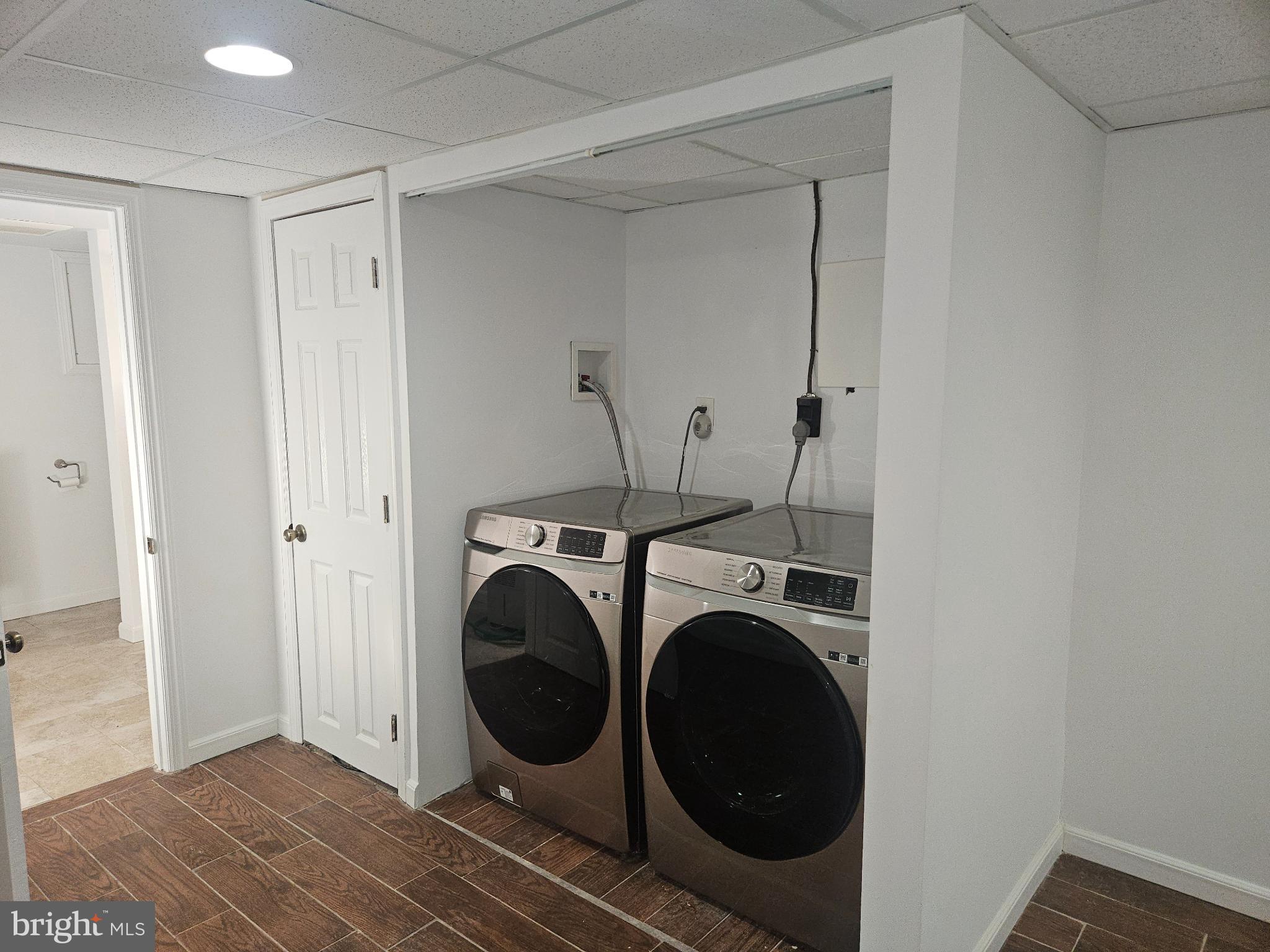 296 Extonville Road Allentown, NJ 08501 - Photo 38 of 46 Modern laundry space with sleek appliances.