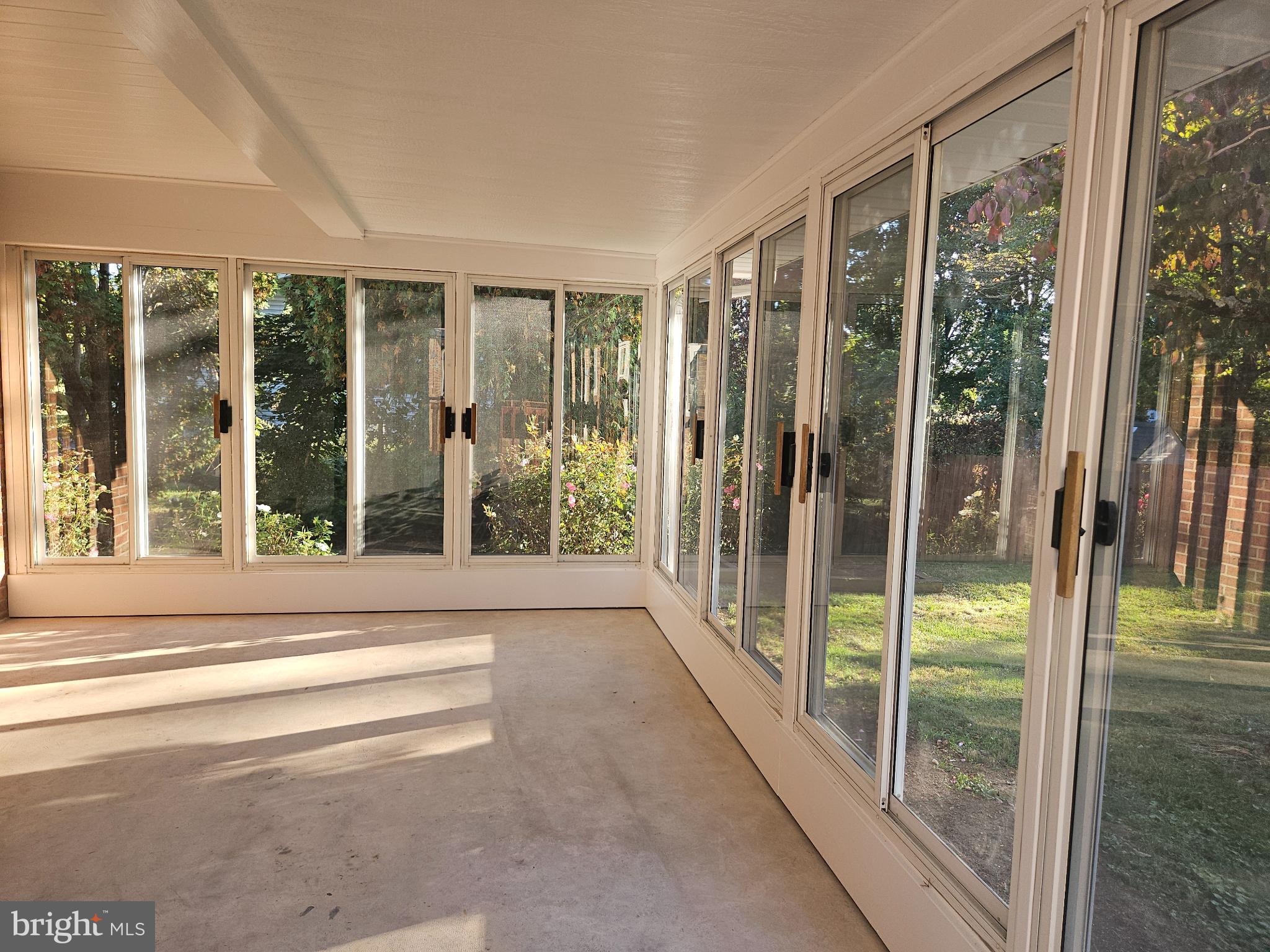 296 Extonville Road Allentown, NJ 08501 - Photo 42 of 46 Bright sunroom with expansive exterior views.