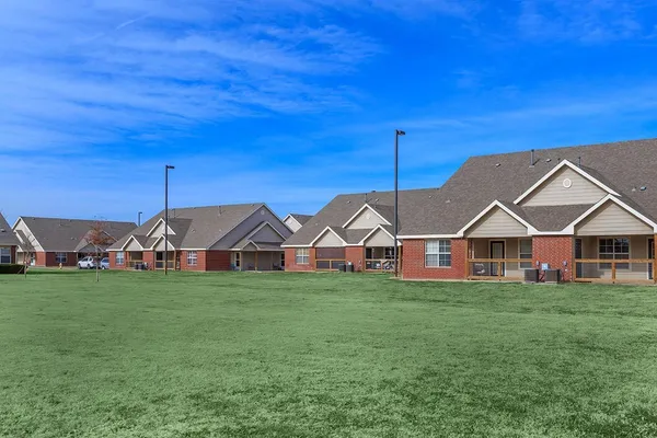a view of a back yard of the house