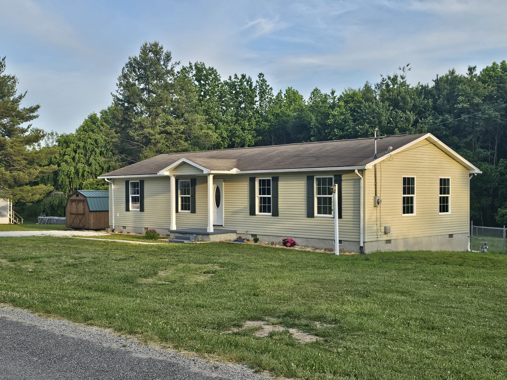 362 Forest Point Road Monteagle, TN 37356 - Photo 13 of 42 a view of a house with a yard