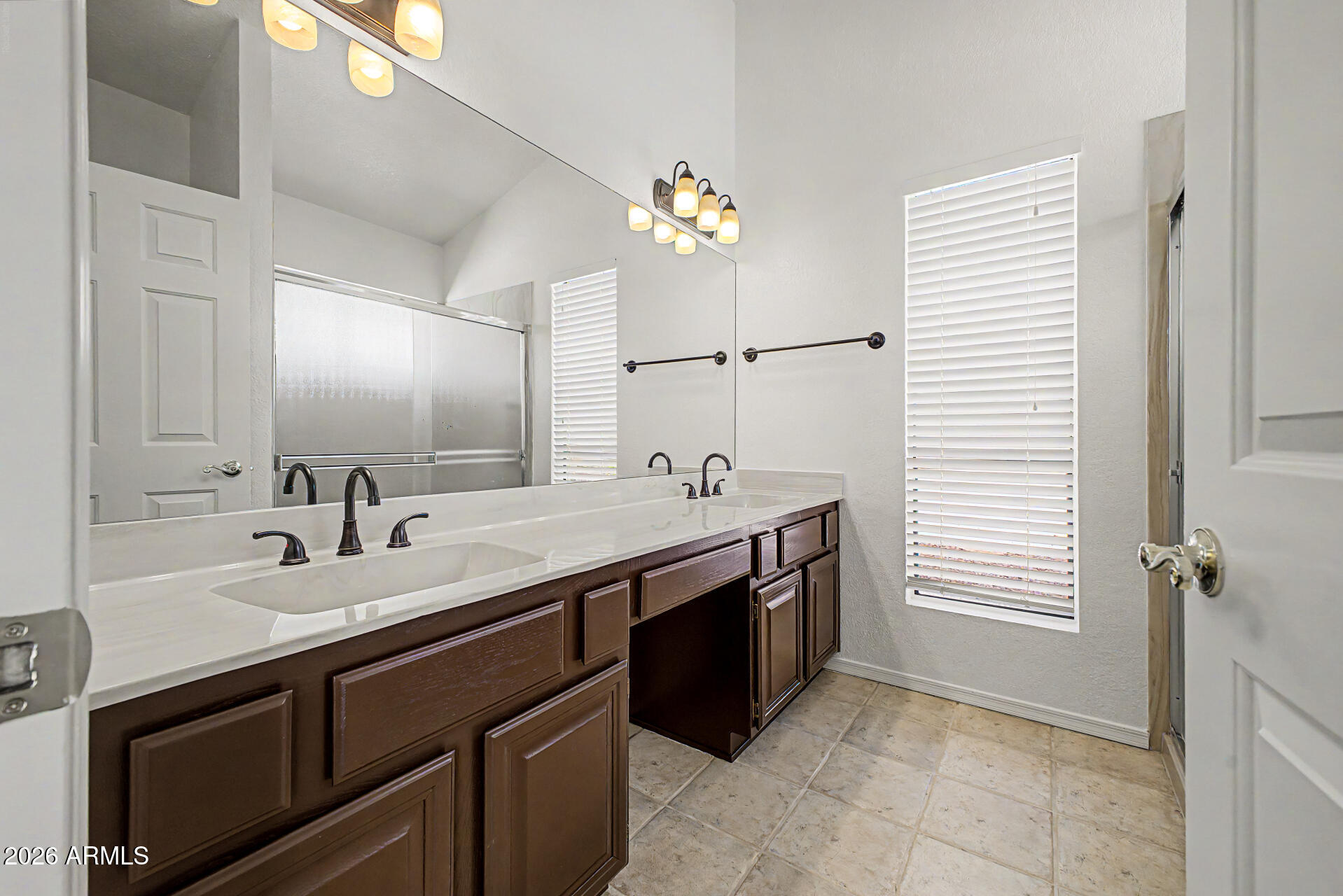 6725 West Utopia Road Glendale, AZ 85308 - Photo 15 of 27 a kitchen with a sink and a stove