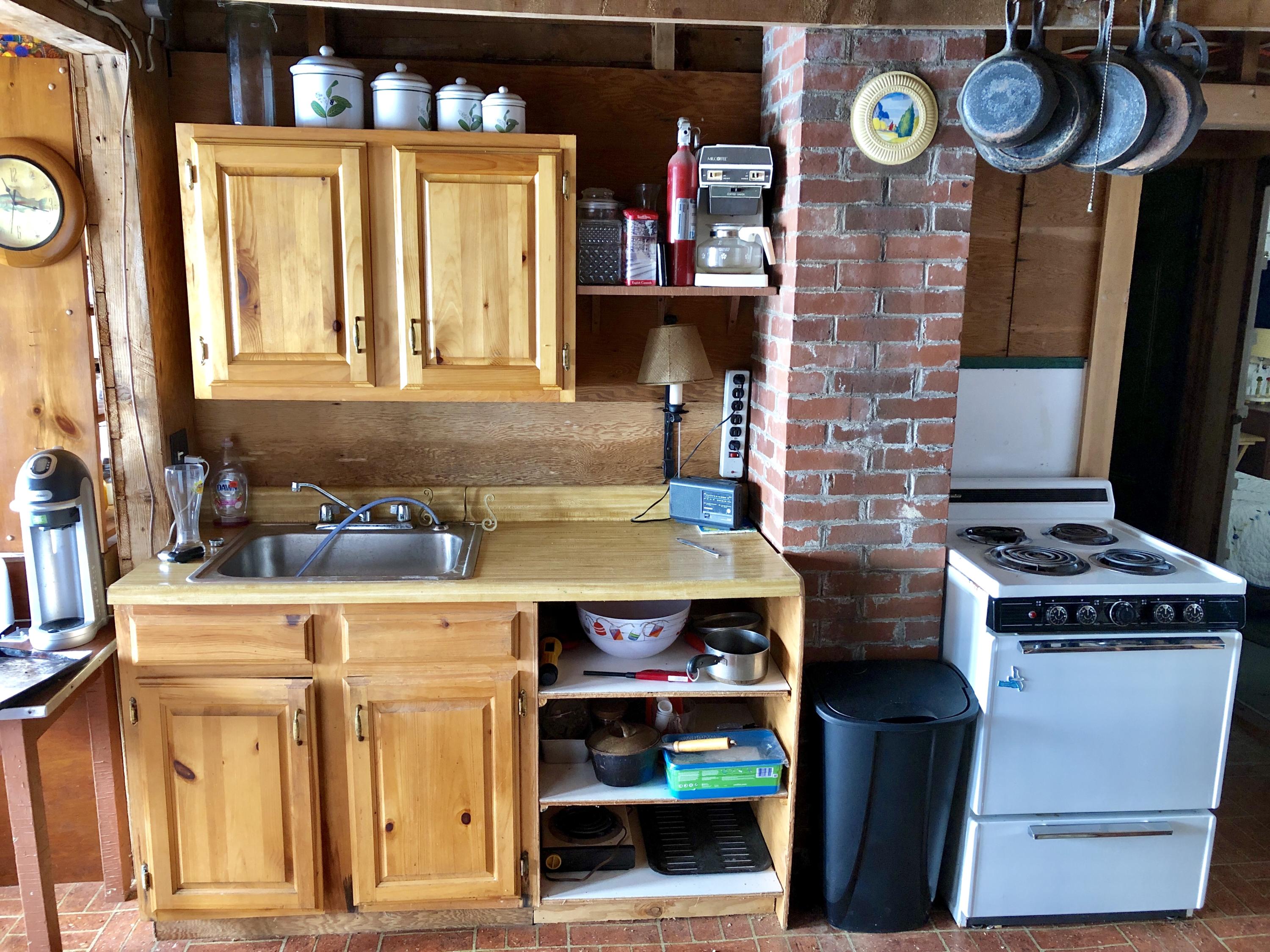 35 Lupine Way Perry, ME 04667 - Photo 19 of 32 35 Lupine Way. log cabin, kitchen sink a