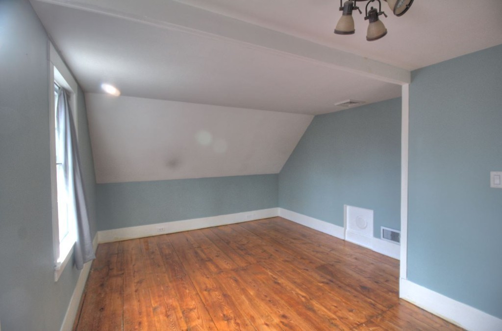 157 Fitchburg Road Townsend, MA 01469 - Photo 11 of 17 a view of empty room with wooden floor