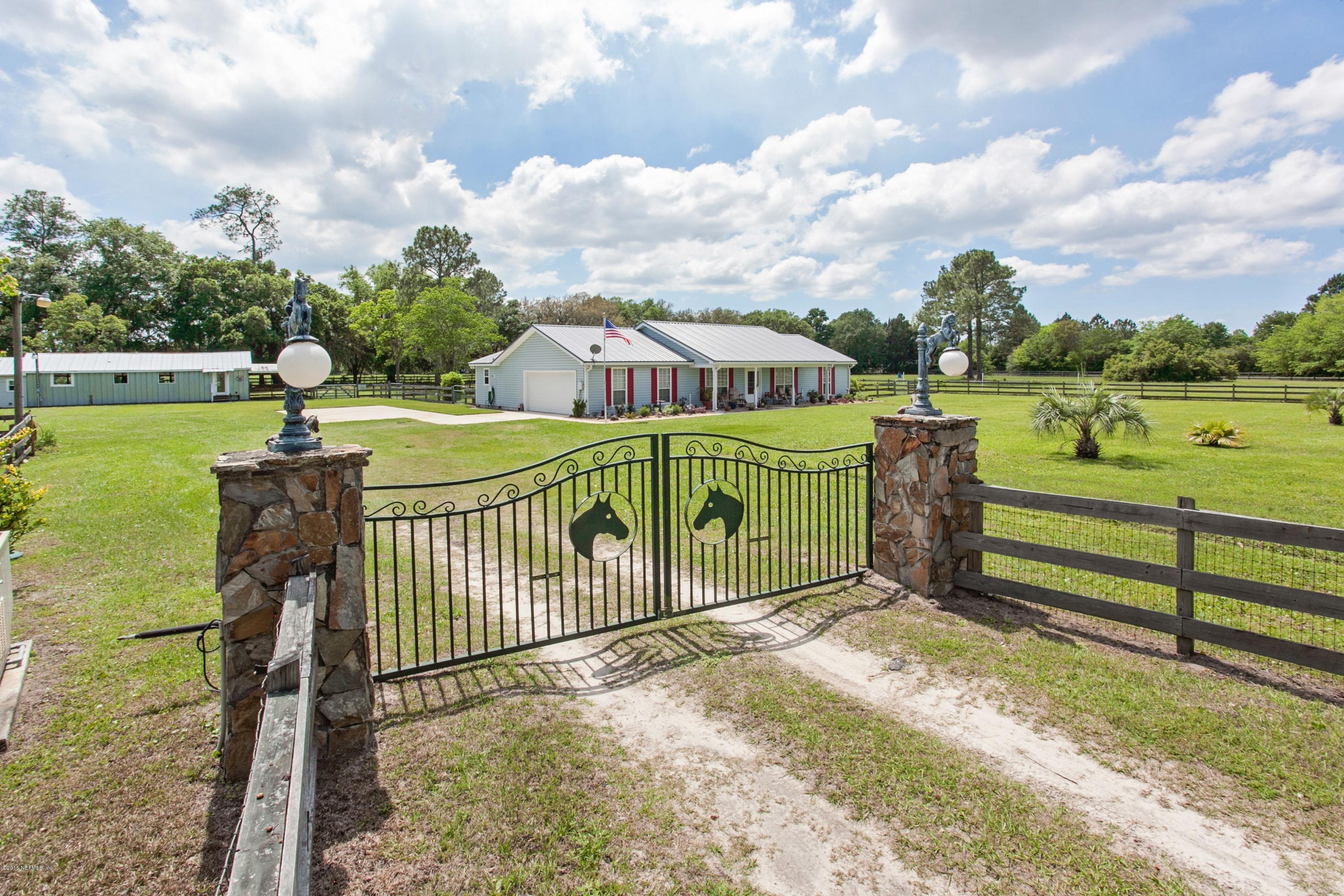 4735 Wolfe Road St. Augustine, FL 32092 - Photo 2 of 39 a view of a garden with an outdoor space