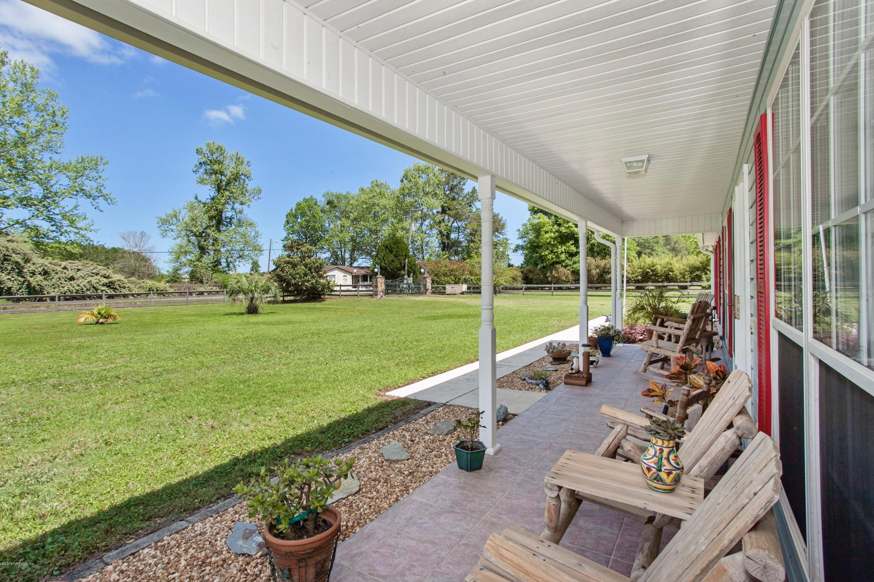 4735 Wolfe Road St. Augustine, FL 32092 - Photo 7 of 39 a view of a patio with garden