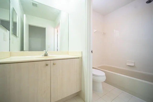 a view of a backyard with a small pool