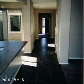 9328 West Berkeley Road Phoenix, AZ 85037 - Photo 9 of 13 a view of a hallway