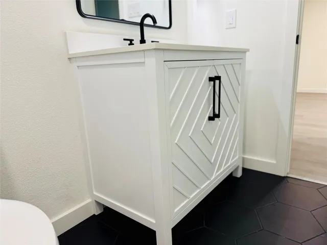 a view of a bathroom with a sink