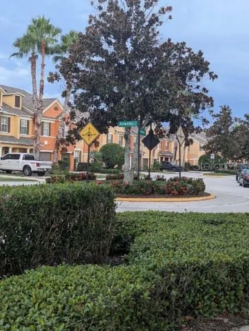 a view of street with houses and trees