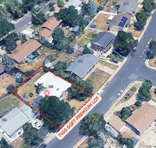 an aerial view of residential house with outdoor space