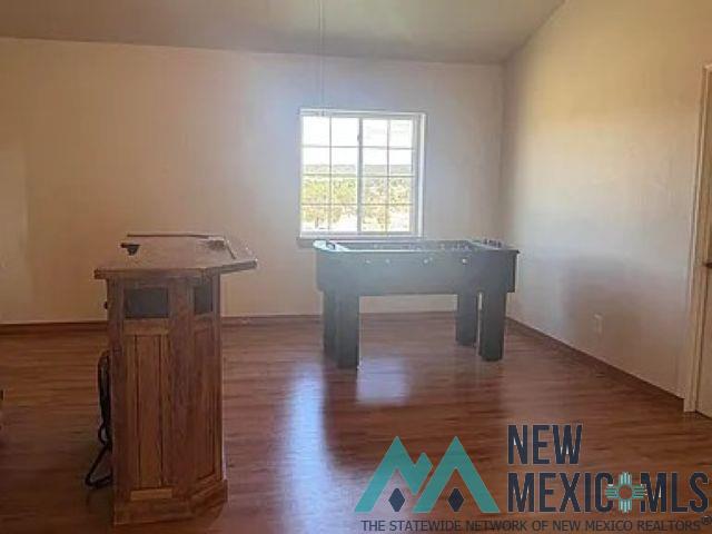32 Hickey Road Pie Town, NM 87827 - Photo 25 of 39 Rec room with wood finished floors