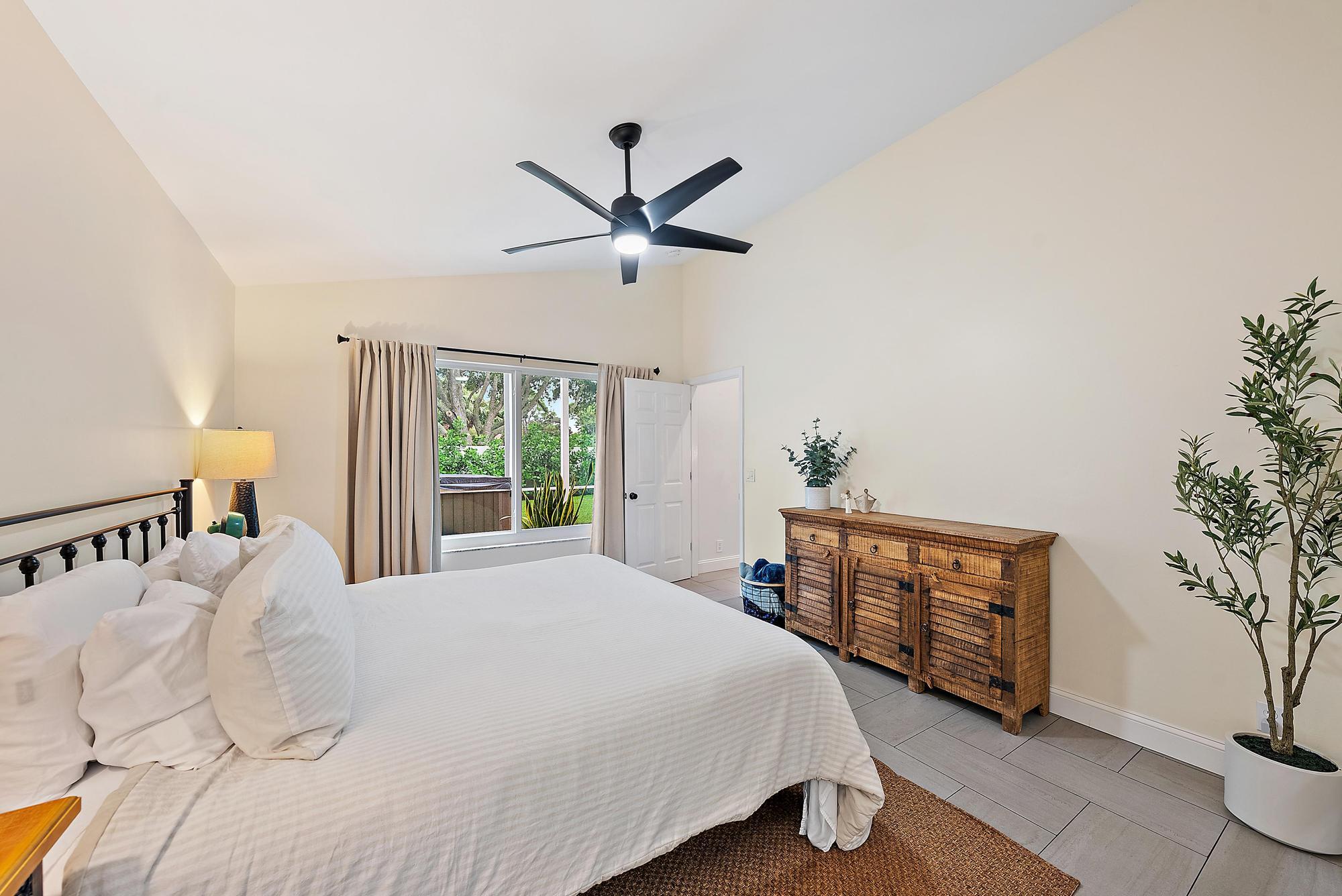 112 Spoonbill Court Jupiter, FL 33458 - Photo 11 of 28 Primary bedroom