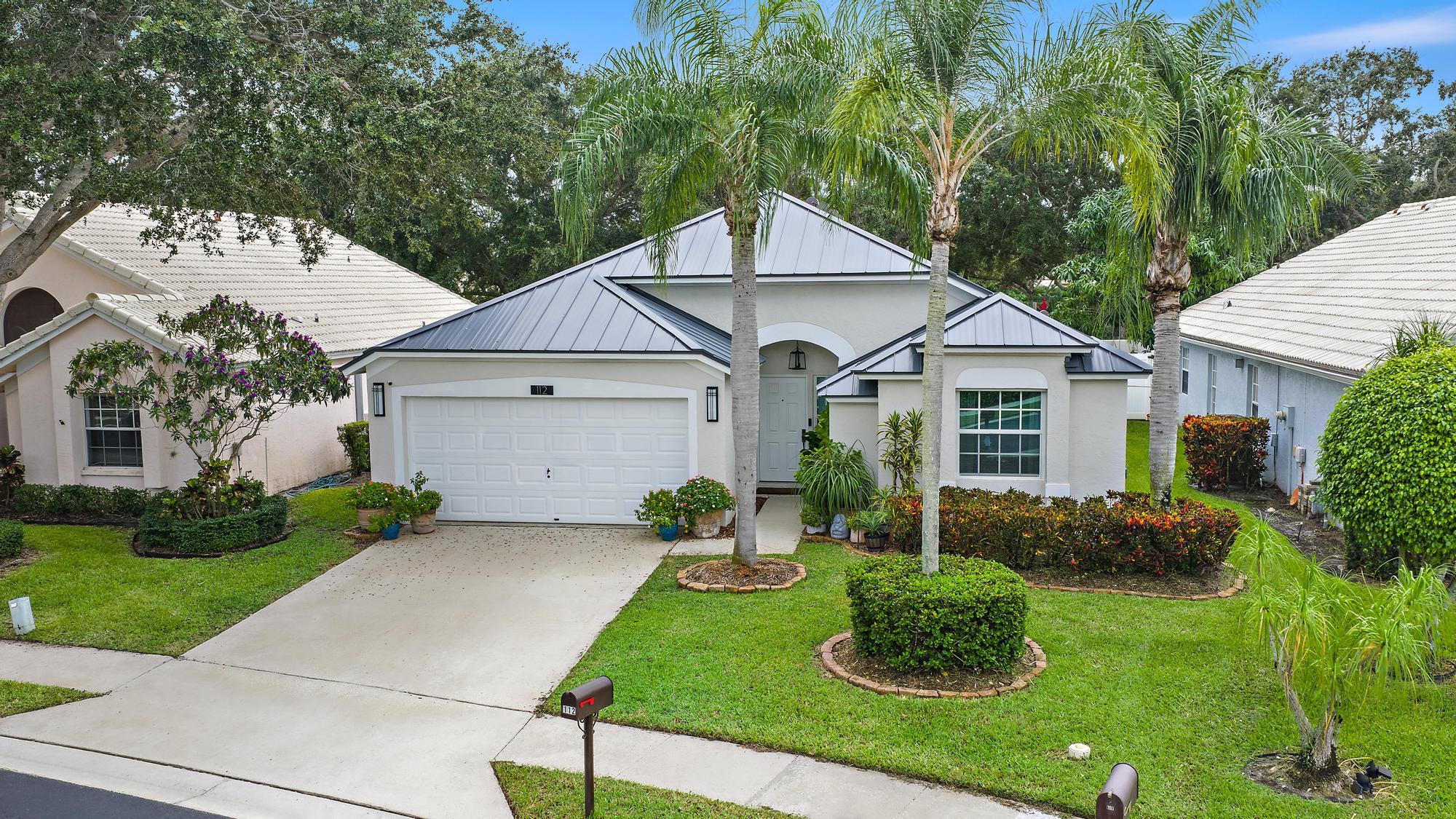 112 Spoonbill Court Jupiter, FL 33458 - Photo 19 of 28 Front of home