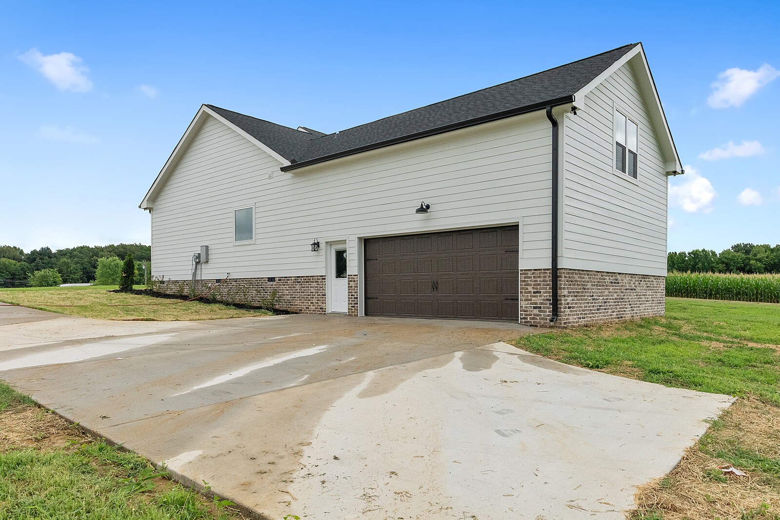 4462 Corbin Sneed Road Springfield, TN 37172 - Photo 21 of 22 a front view of a house with a yard and garage