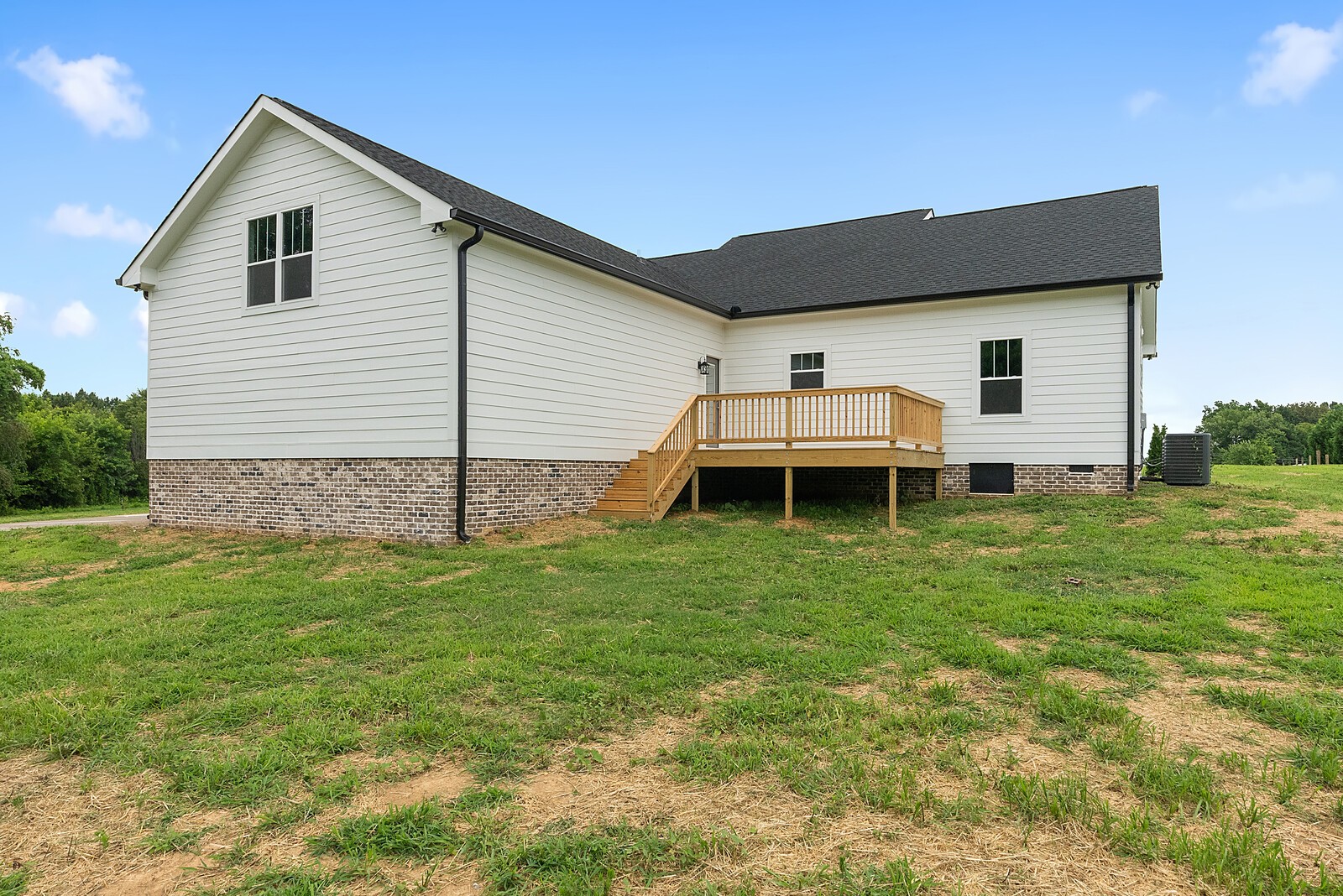 4462 Corbin Sneed Road Springfield, TN 37172 - Photo 22 of 22 a backyard of a house with table and chairs