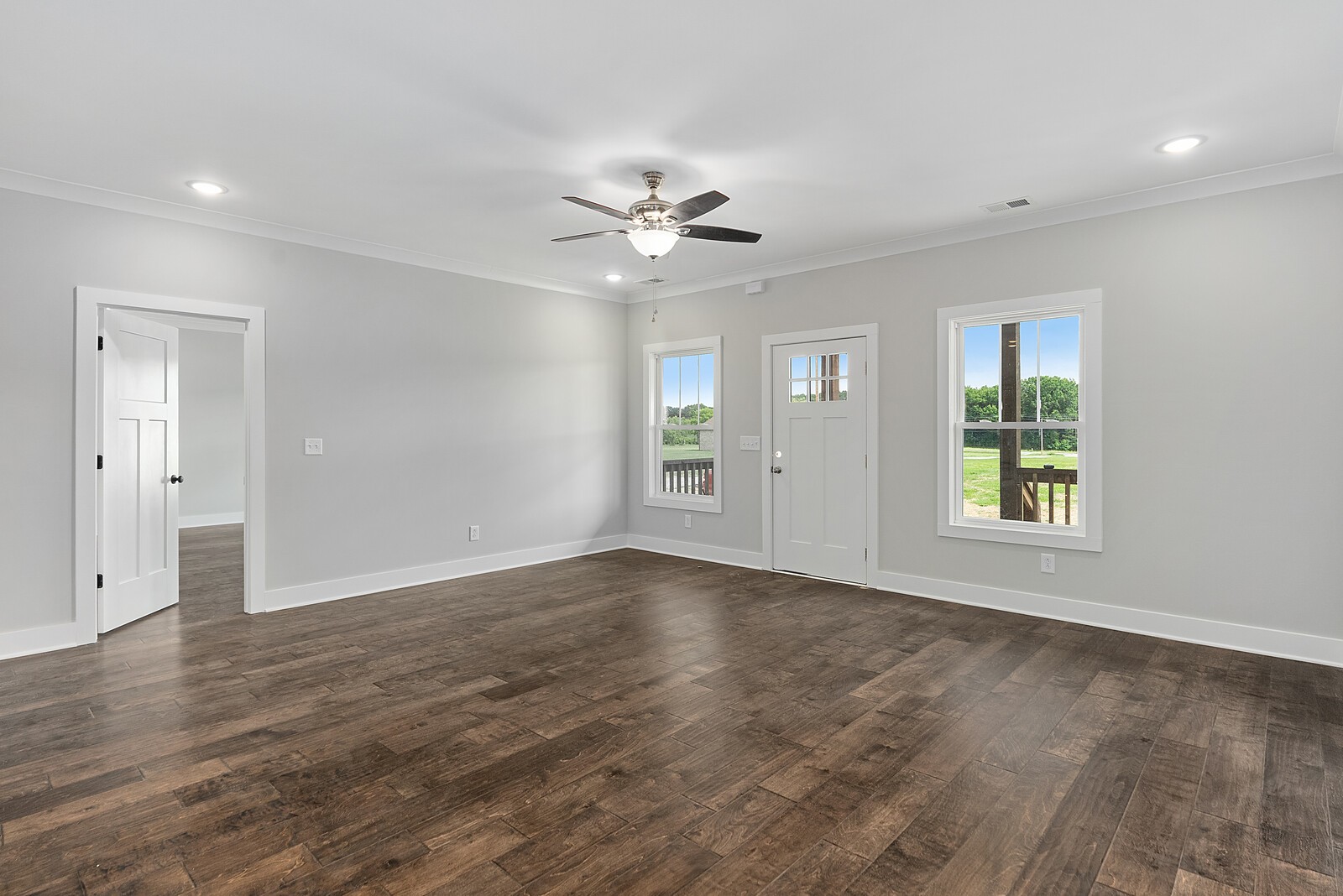 4462 Corbin Sneed Road Springfield, TN 37172 - Photo 4 of 22 a view of an empty room with a window and wooden floor