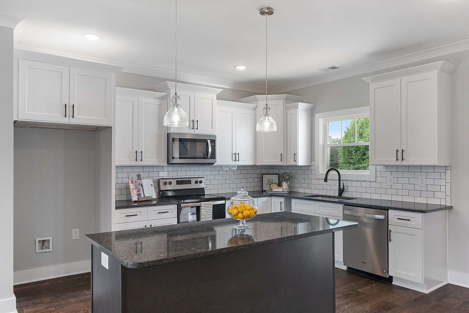 4462 Corbin Sneed Road Springfield, TN 37172 - Photo 6 of 22 a kitchen with stainless steel appliances granite countertop a sink a stove and a refrigerator