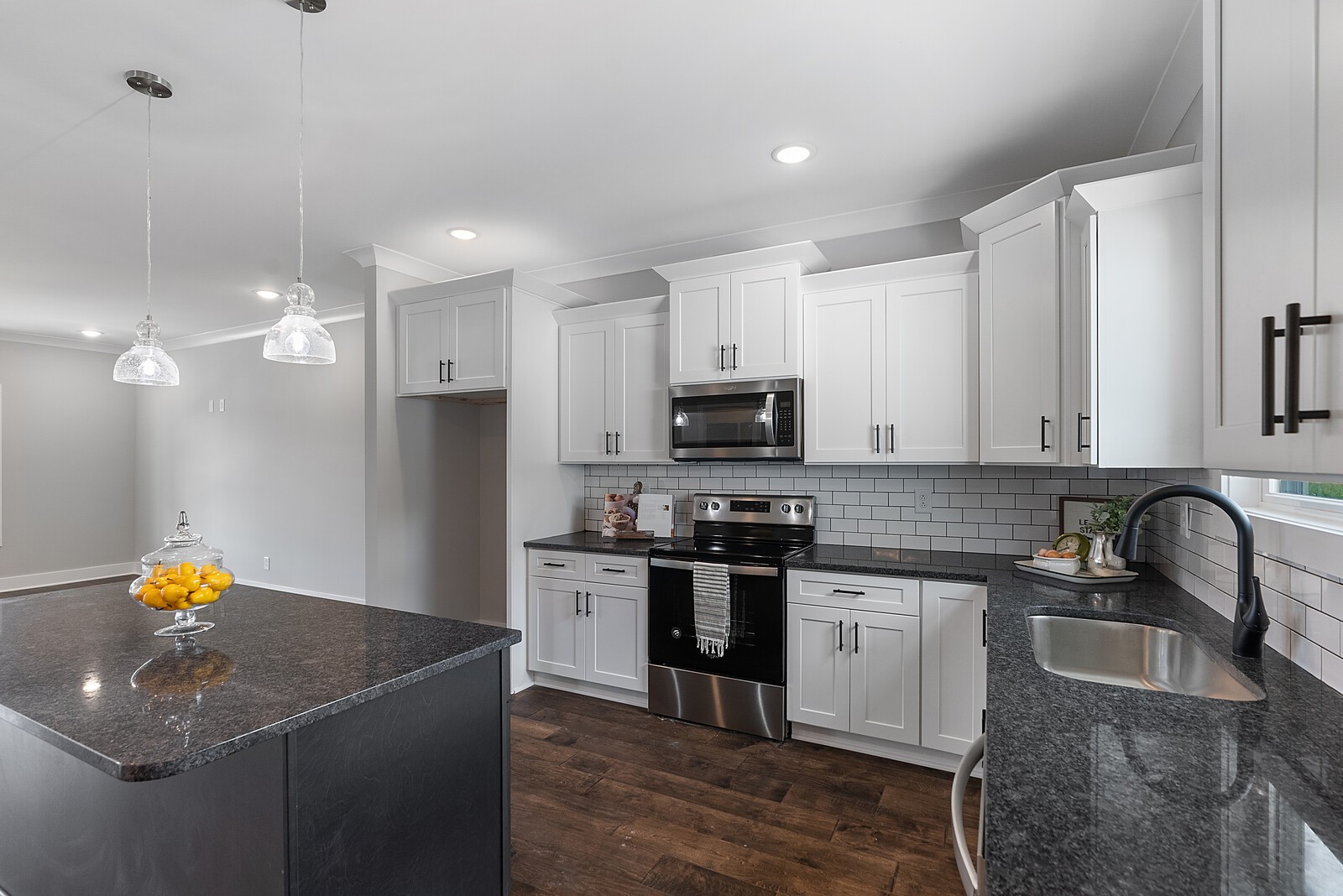 4462 Corbin Sneed Road Springfield, TN 37172 - Photo 7 of 22 a kitchen with stainless steel appliances granite countertop a sink stove and refrigerator
