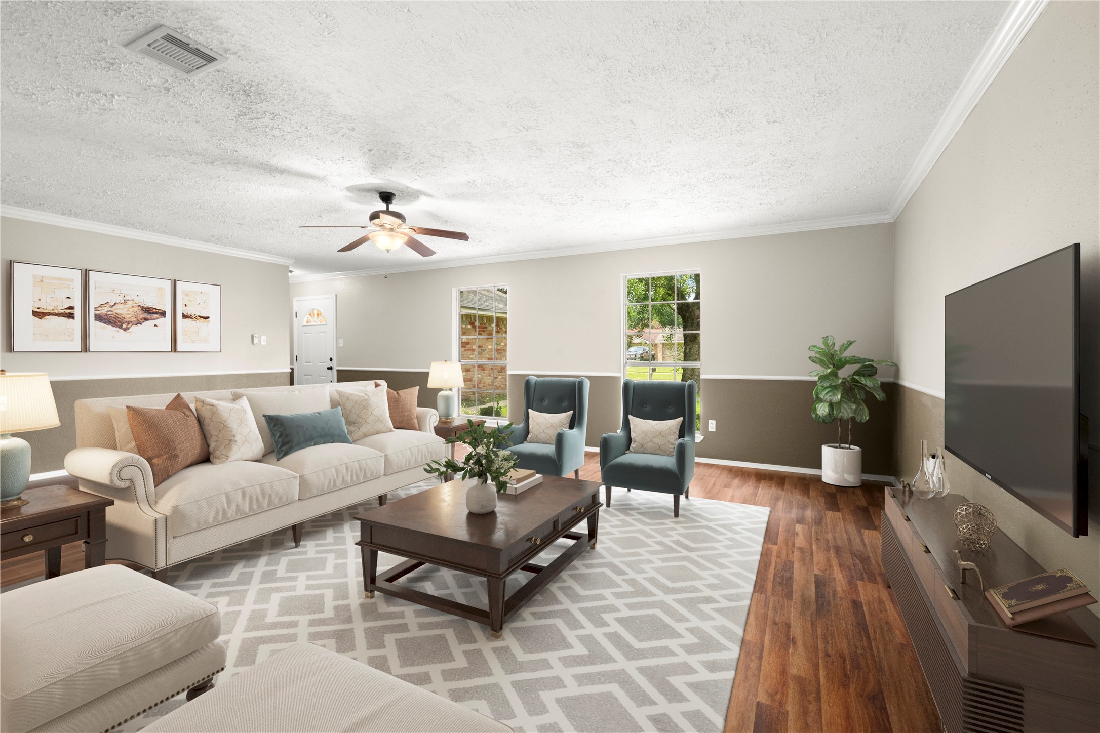 14219 Jaquine Drive Cypress, TX 77429 - Photo 2 of 16 a living room with furniture a wooden floor and a flat screen tv