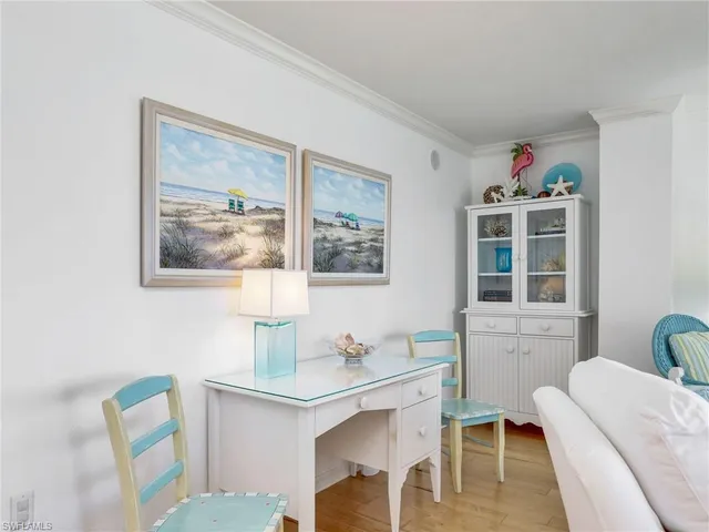 a living room with furniture and window