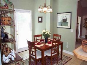 311 Adrian Road Salisbury, NC 28146 - Photo 2 of 8 a view of a dining room with furniture and chandelier