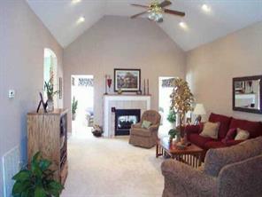311 Adrian Road Salisbury, NC 28146 - Photo 3 of 8 a living room with furniture and a fireplace