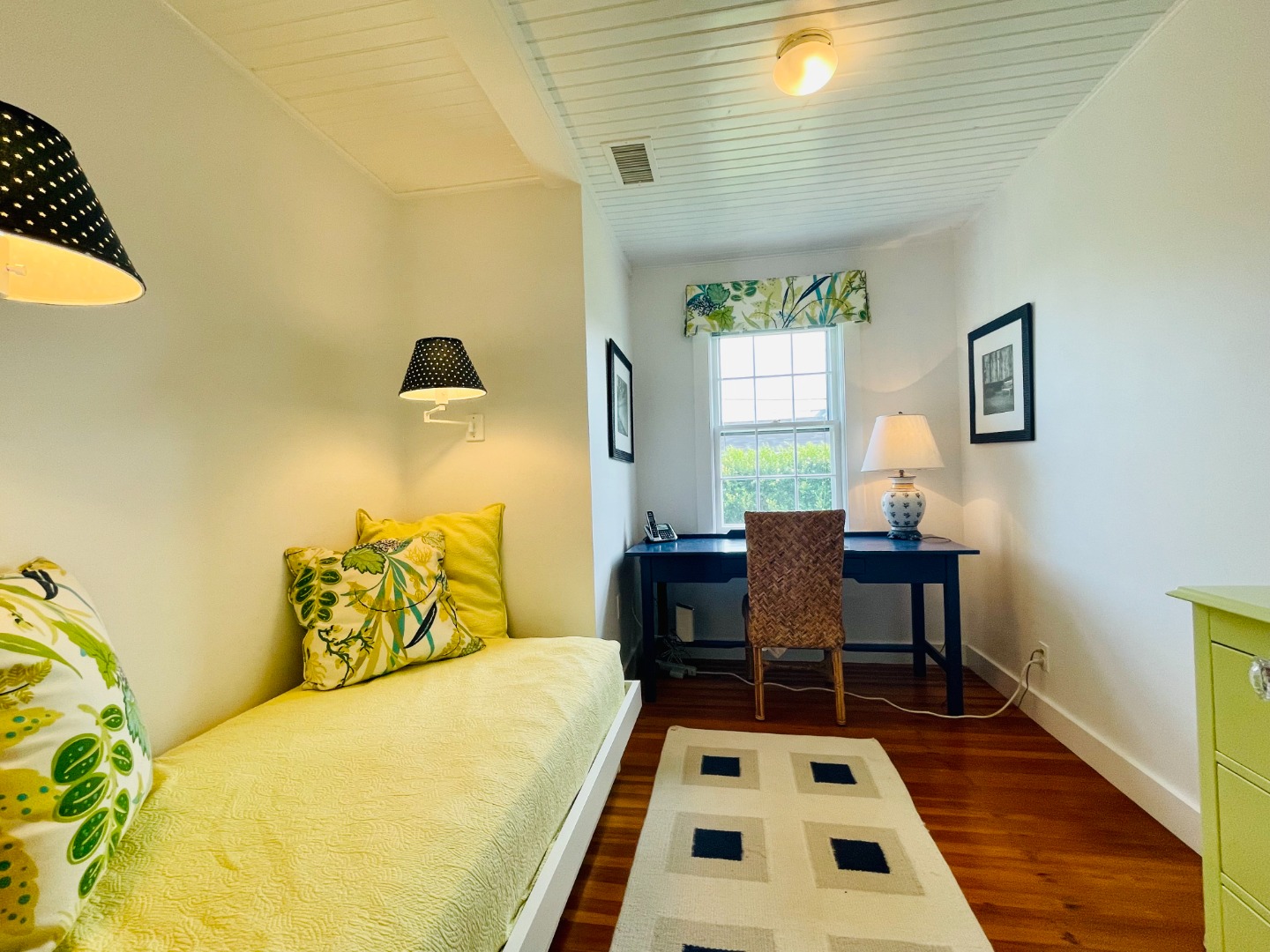 76 Baxter Road Nantucket, MA 02554 - Photo 12 of 25 a dining room with a table and chairs