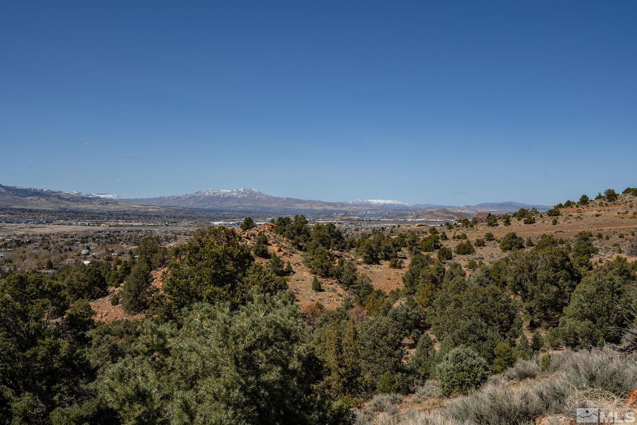 0 Temple Hill Road Reno, NV 89521 - Photo 4 of 15 a view of a large building with mountains in the background