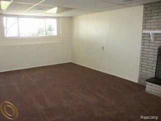 5811 Maybee Road Clarkston, MI 48346 - Photo 6 of 10 family room view 2