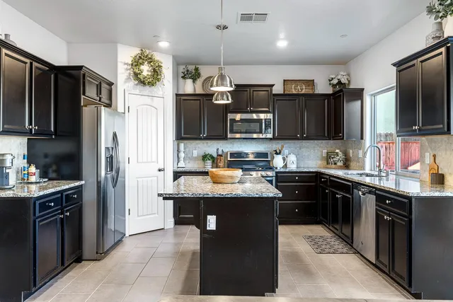 a living room with furniture and a couch