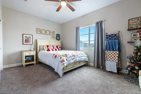 a bedroom with furniture and a window