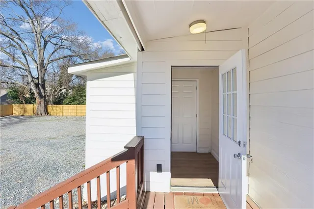 a view of a house with a yard and garage