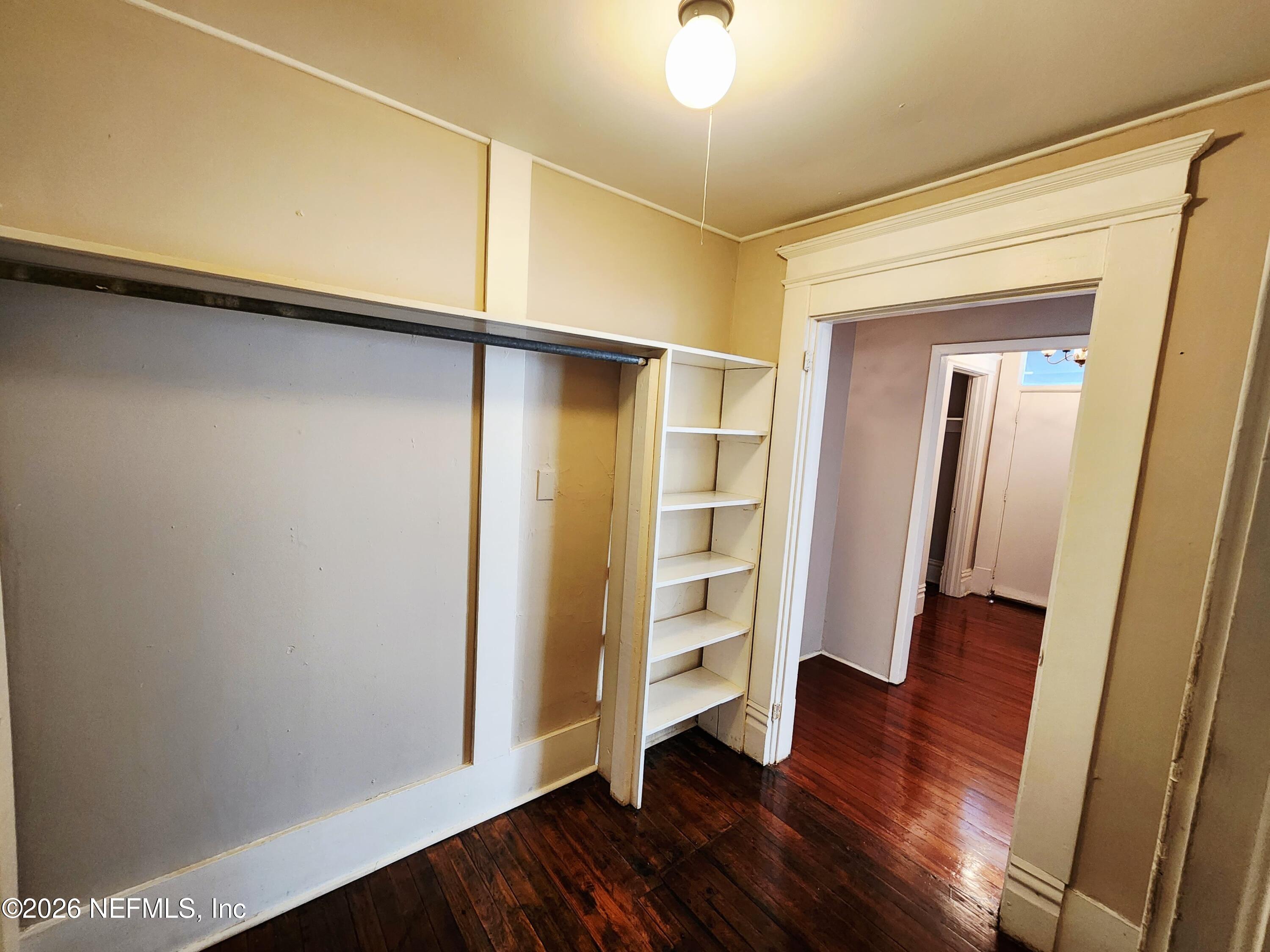 1719 Aberdeen Street Jacksonville, FL 32205 - Photo 12 of 17 an empty room with wooden floor