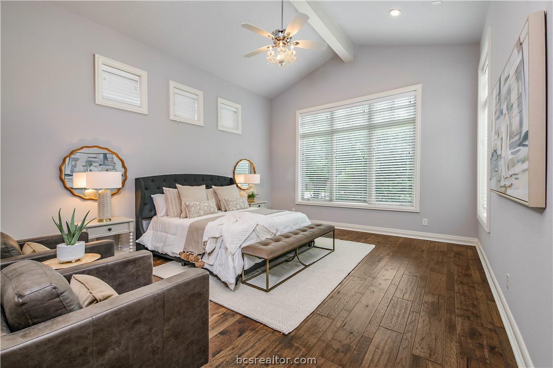 4207 Tuscany Court Bryan, TX 77802 - Photo 25 of 46 a bedroom with bed and a large window
