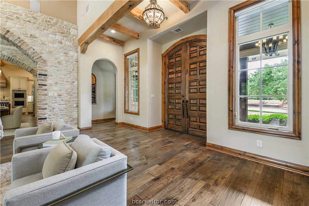 4207 Tuscany Court Bryan, TX 77802 - Photo 5 of 46 a living room with furniture and a large window