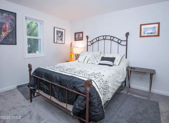 a bathroom with a sink vanity and a mirror