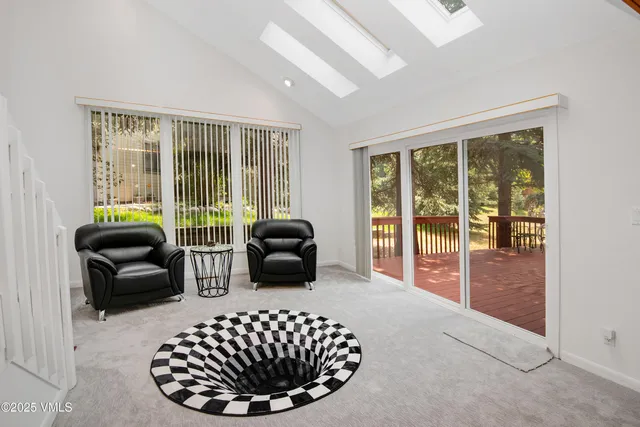 a view of an empty room with a closet