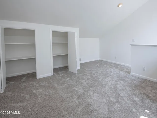 a view of a patio with wooden floor