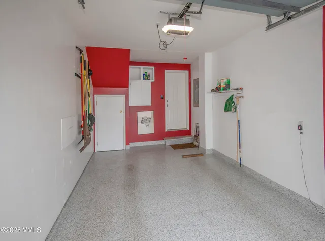 a backyard of a house with outdoor seating