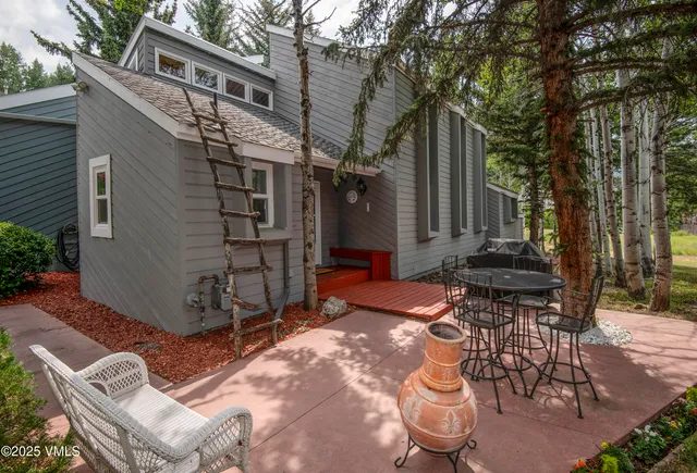 a view of water with a large trees