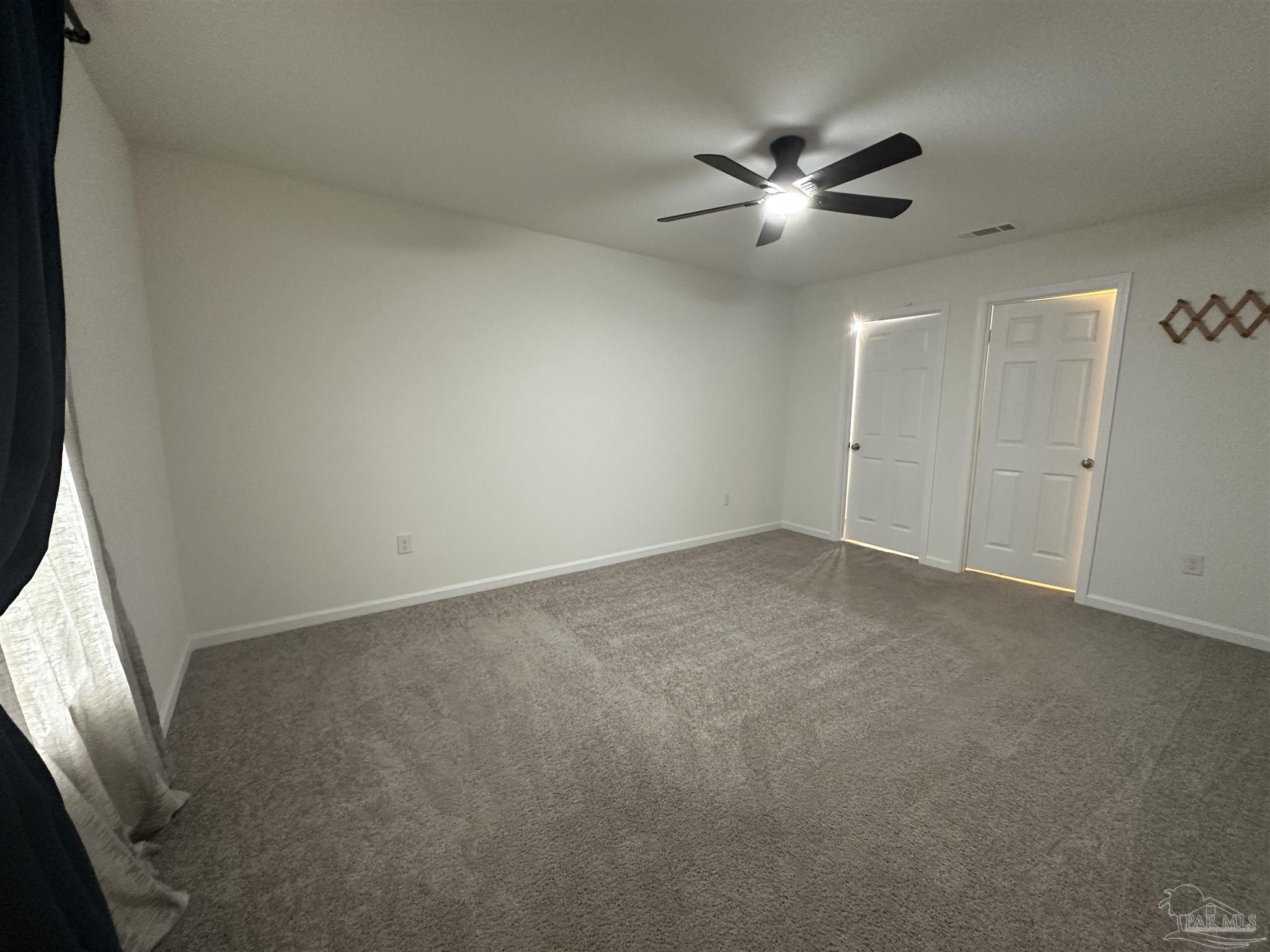 8752 Schooner Lane Pensacola, FL 32507 - Photo 6 of 13 a view of an empty room