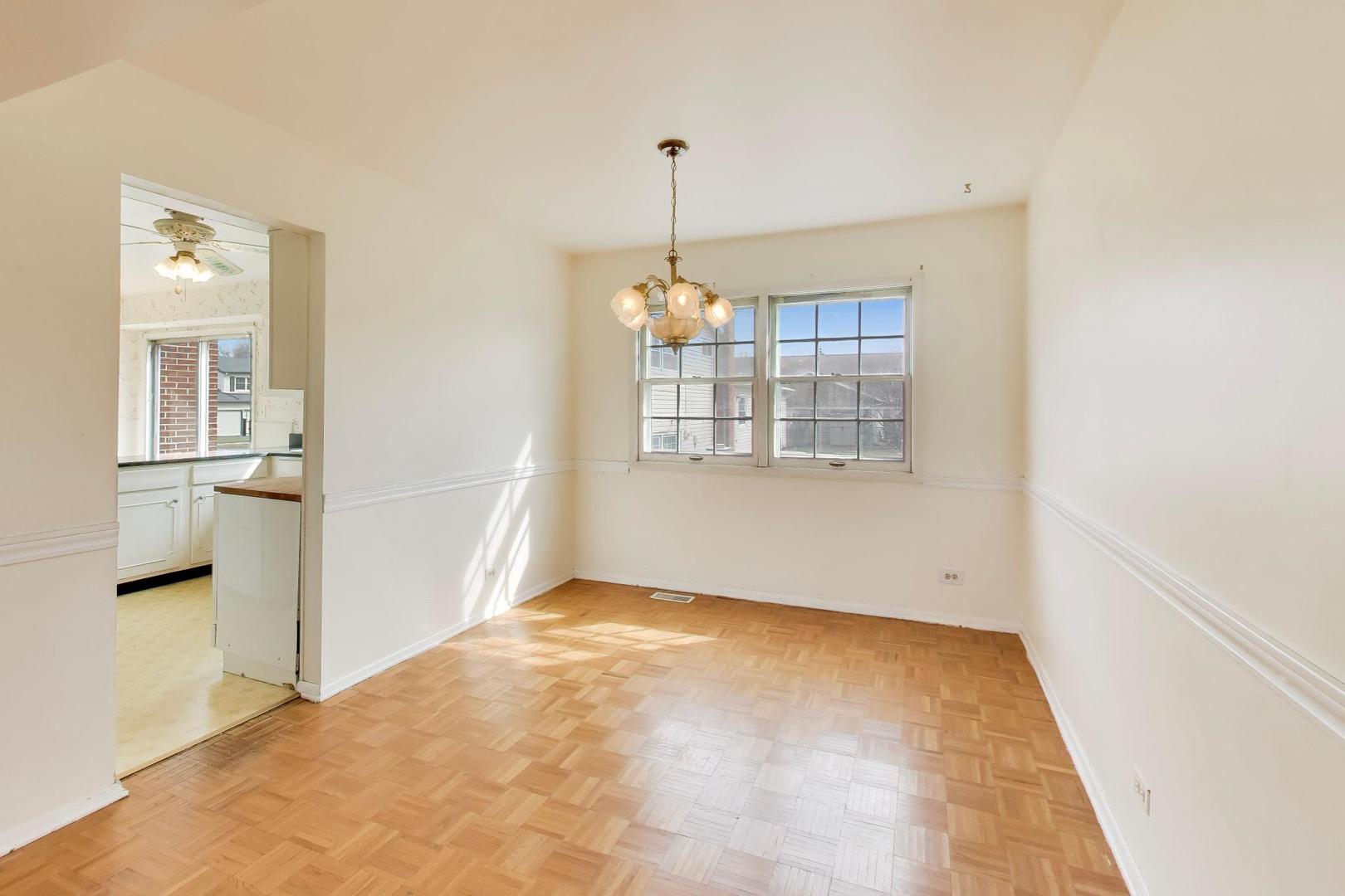 2703 North Ridge Avenue Arlington Heights, IL 60004 - Photo 11 of 51 a view of an empty room with a window