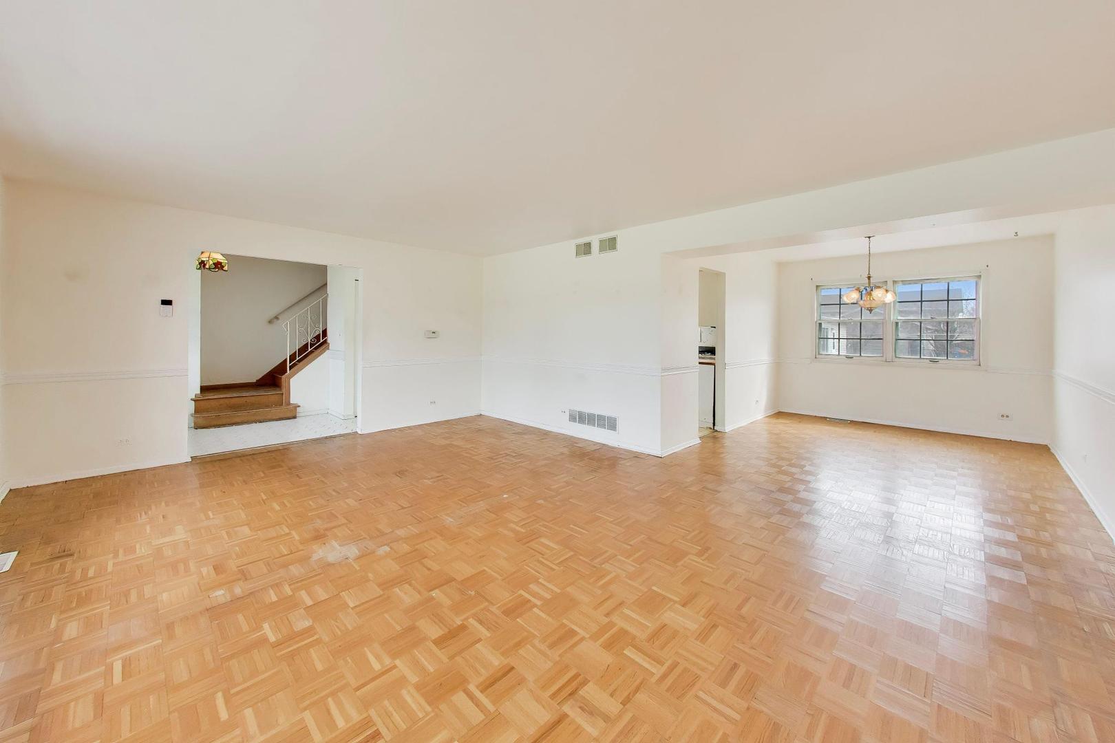 2703 North Ridge Avenue Arlington Heights, IL 60004 - Photo 9 of 51 a view of empty room with wooden floor