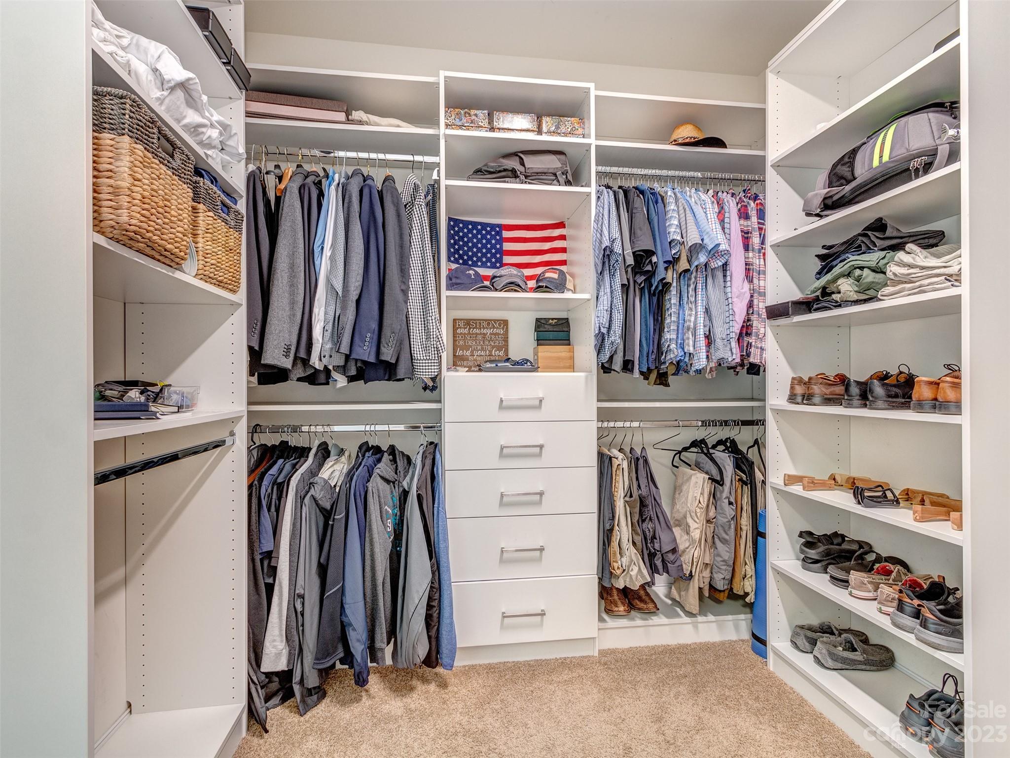 5515 Braddock Ml Way Lancaster, SC 29720 - Photo 22 of 41 a view of walk in closet with clothes and shoes