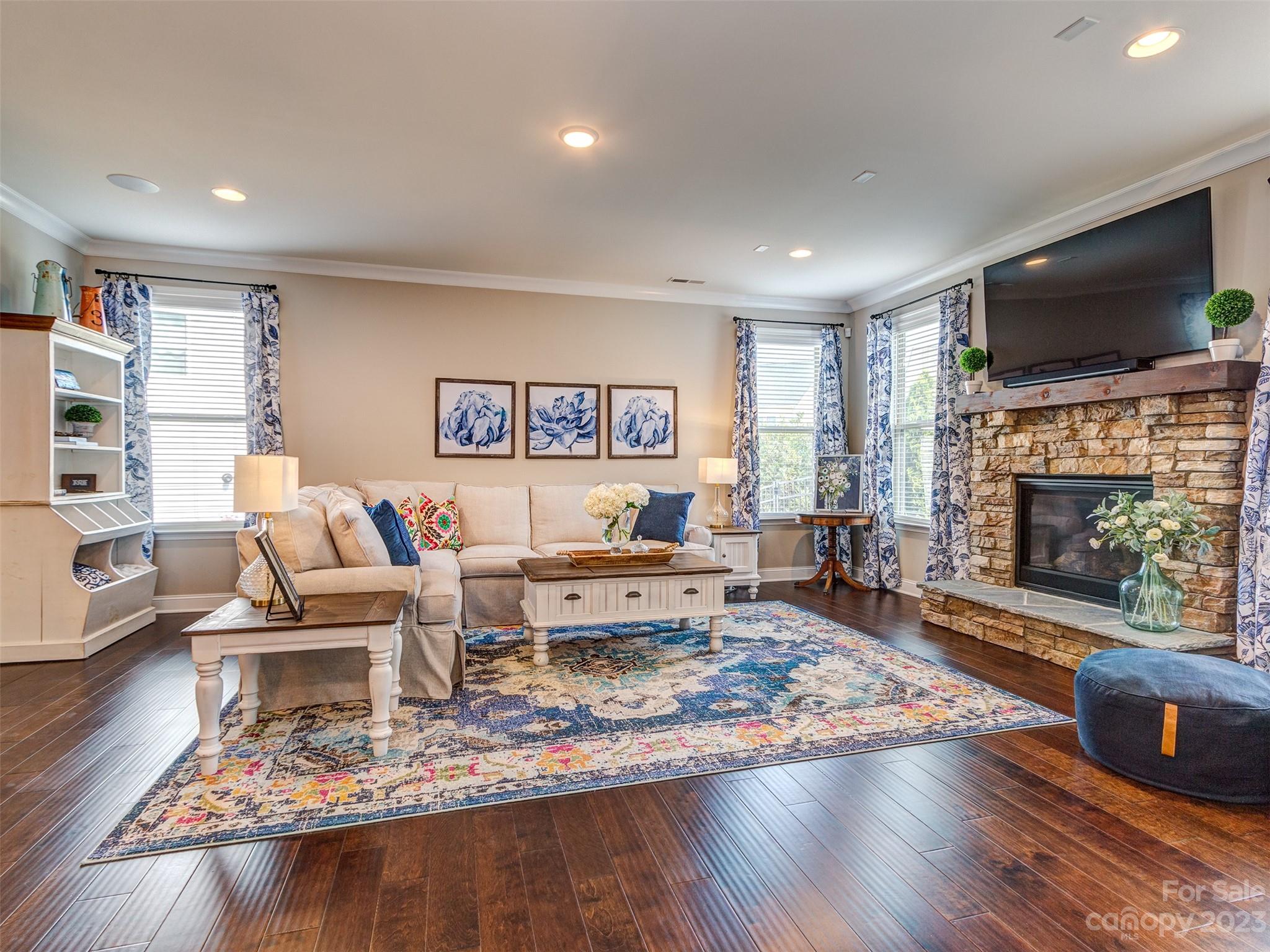 5515 Braddock Ml Way Lancaster, SC 29720 - Photo 3 of 41 a living room with furniture flat screen tv and a fireplace