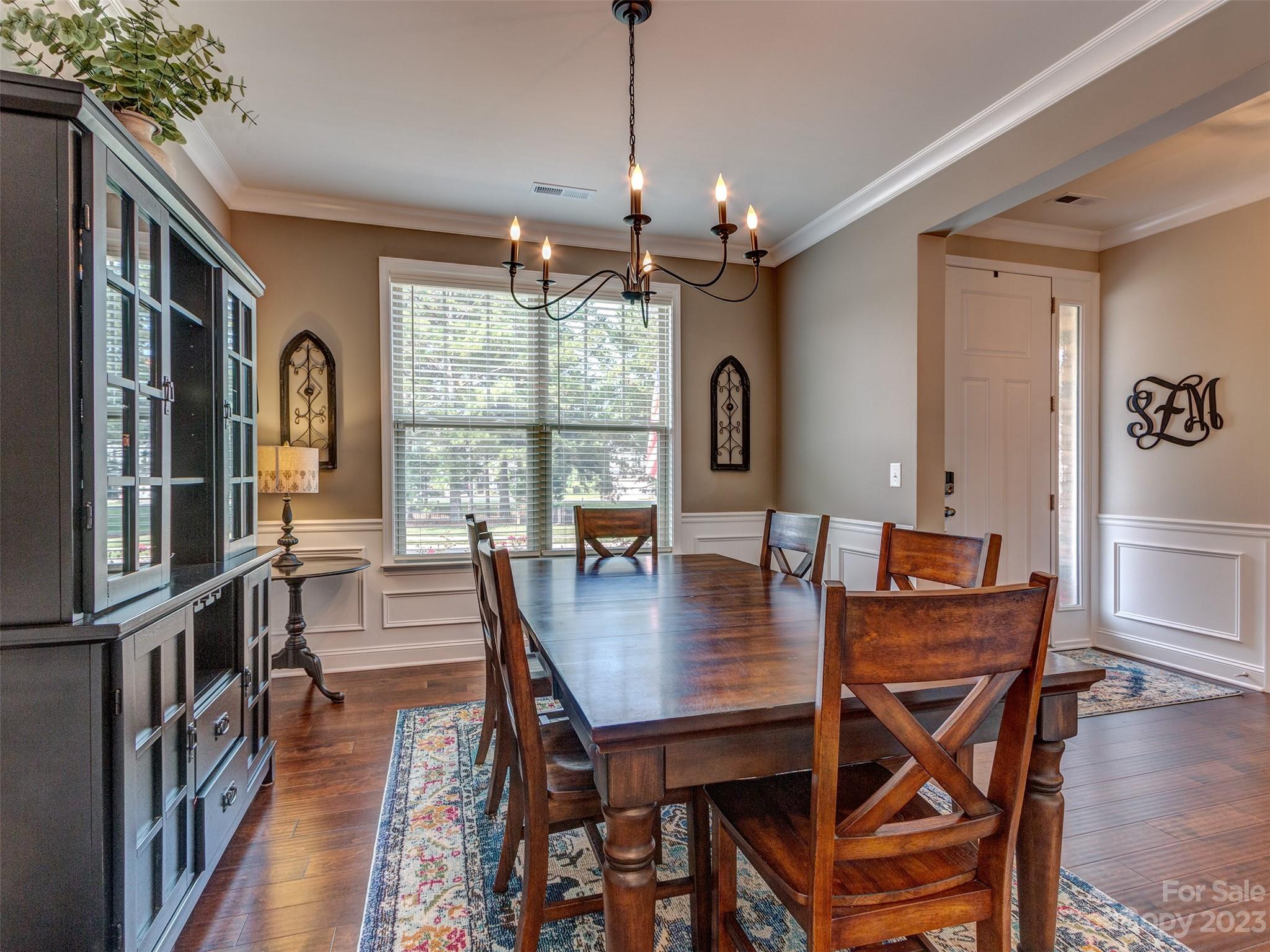 5515 Braddock Ml Way Lancaster, SC 29720 - Photo 8 of 41 a view of a dining room with furniture window and wooden floor
