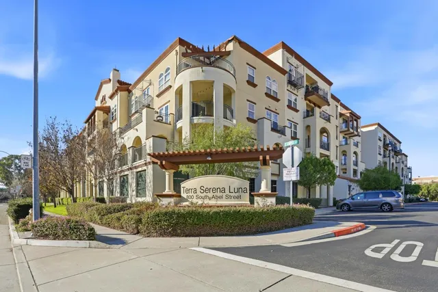 a view of a building with a street